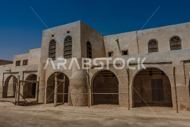 A facade and entrance to Aqeer Castle, Saudi Arabia