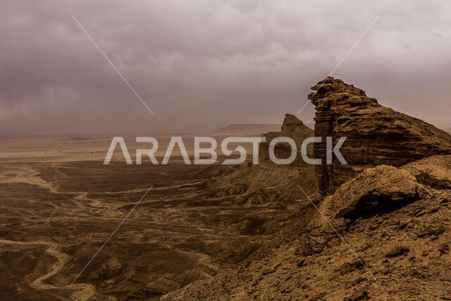 Desert landscape with thunderclouds and sandstorm in Lower Najd, Saudi Arabia