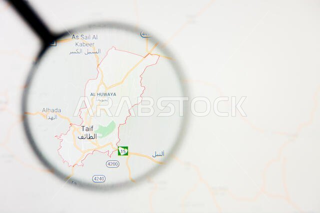 Taif city visualization illustrative concept on screen through magnifying glass