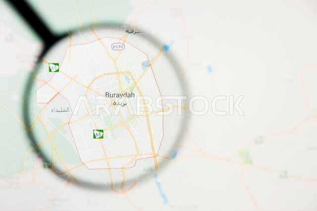 تصور مدينة بريدة، مفهوم توضيحي على الشاشة من خلال عدسة مكبرة تصور مدينة بريدة، مفهوم توضيحي على الشاشة من خلال عدسة مكبرة