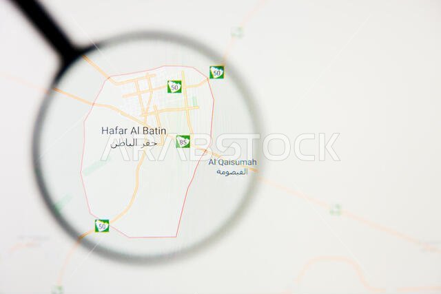 تصور مدينة حفر الباطن، مفهوم توضيحي على الشاشة من خلال عدسة مكبرة