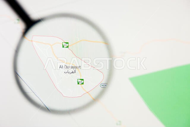 مدينة القريات في المملكة العربية السعودية - تصور توضيحي على الشاشة من خلال عدسة مكبرة مدينة القريات في المملكة العربية السعودية - تصور توضيحي على الشاشة من خلال عدسة مكبرة