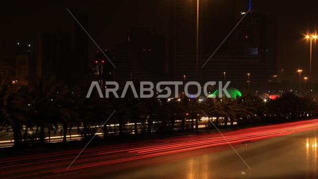 Long Exposure of Riyadh City Streets near King Abdullah Financial District (KAFD) with lights from Winter Wonderland and view from King Fahd Road