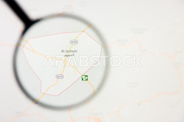 Al Jumum city in Saudi Arabia visualization illustrative concept on screen through magnifying glass