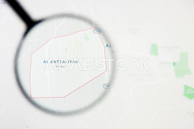 مدينة الكتالية في المملكة العربية السعودية - تصور توضيحي على الشاشة من خلال عدسة مكبرة