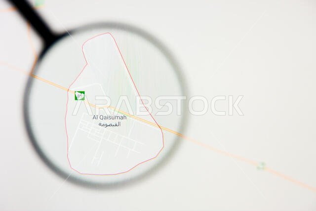 تصور مدينة القيصومة في المملكة العربية السعودية، مفهوم توضيحي على الشاشة من خلال عدسة مكبرة