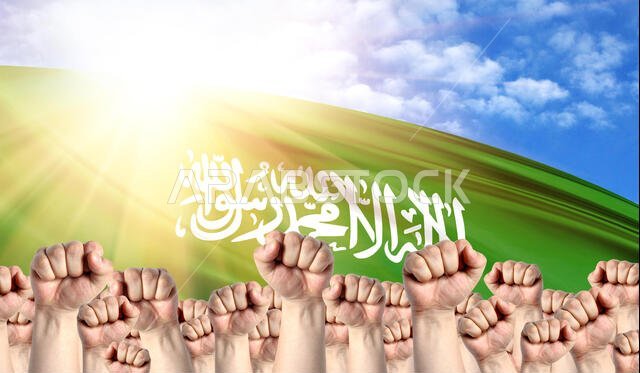 Labor Day concept with fists of men against the background of the flag of Saudi Arabia