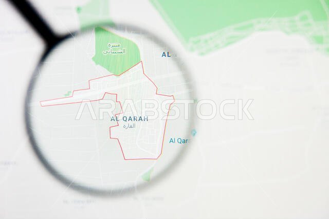 Al Qarah city in Saudi Arabia visualization illustrative concept on screen through magnifying glass