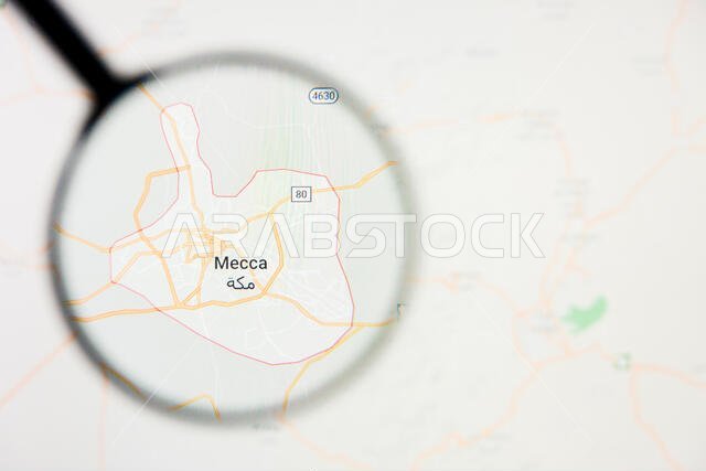 تصور مدينة مكة المكرمة، مفهوم توضيحي على الشاشة من خلال عدسة مكبرة تصور مدينة مكة المكرمة، مفهوم توضيحي على الشاشة من خلال عدسة مكبرة