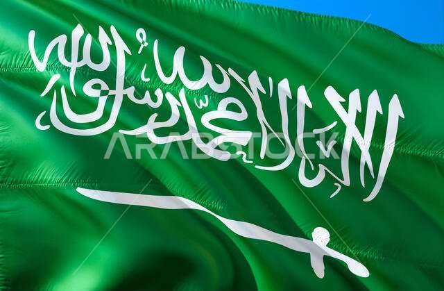علم المملكة العربية السعودية. تصميم ثلاثي الأبعاد لعلم يرفرف. الرمز الوطني للمملكة العربية السعودية، عرض ثلاثي الأبعاد. الألوان الوطنية وعلم المملكة العربية السعودية.