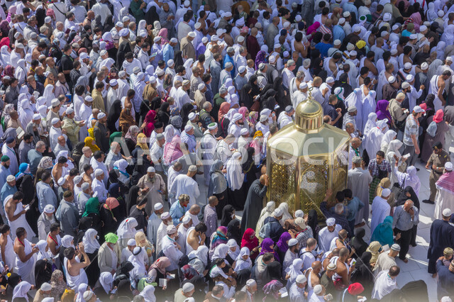 Close-up of Muslim pilgrims inside the Grand Mosque in Mecca, performing Hajj and Umrah, worship and getting closer to God, Islamic religious landmarks, Hajj season 2022