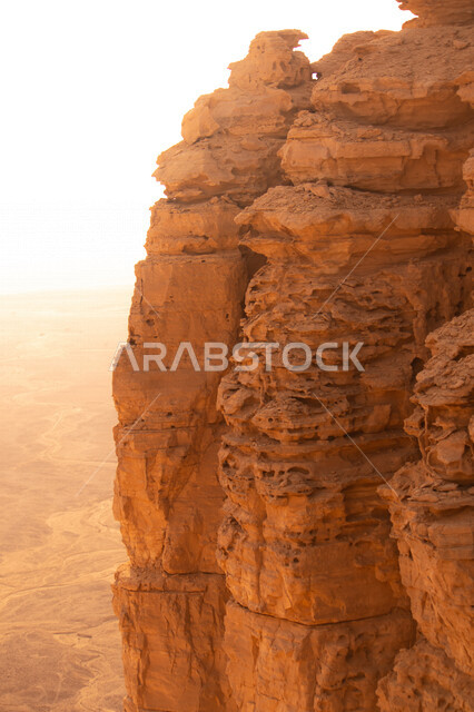 A beautiful landscape of the Tuwaiq mountain range in Riyadh in the Kingdom of Saudi Arabia, the edge of the end of the world, overlooking the Grand Canyon, distinctive tourist areas in Riyadh, tourism in the Kingdom of Saudi Arabia