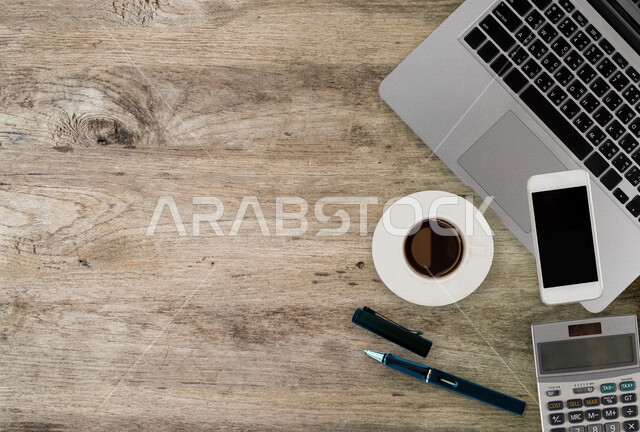 A group of modern technical devices on the office table, the development of technology and technology, computers and tablets on the office table, companies and offices, office table, office background, office work environment, office freelance work, work 