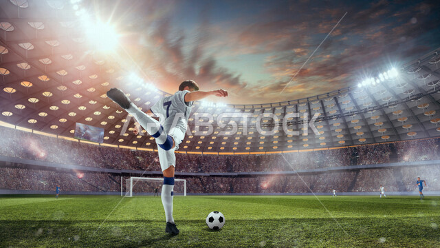 شاب في الملعب يستعد لتسديد الهدف في المرمى ، لاعب كرة قدم، ممارسة رياضة كرة القدم، ملعب كرة قدم، ممارسة الرياضة، المراوغة وتسجيل الاهداف