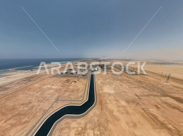 مصنع في وسط الصحراء بالمملكة العربية السعودية، مخطط جوي لاحد مصانع السعودية، التضاريس الصحراوية، الرمال الذهبية، جمال السماء الزرقاء