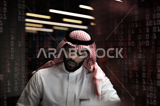 رجل أعمال سعودي عربي خليجي يعمل داخل مقر الشركة , تطوير المشاريع الجديدة , رسومات بيانية بتقنية الهولوجرام , شركات سعودية .