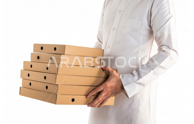 Portrait of a Saudi Arabian Gulf man delivering orders, express delivery, delivery orders, home delivery services, online ordering, food delivery services, online orders, white background