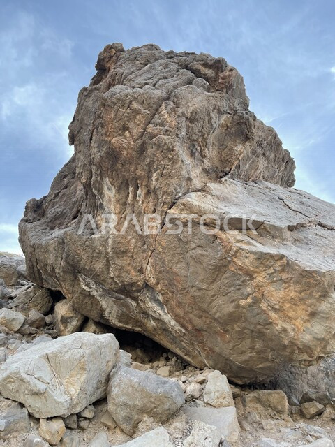 Close-up of large stones, cobblestones, blue sky, natural rocks