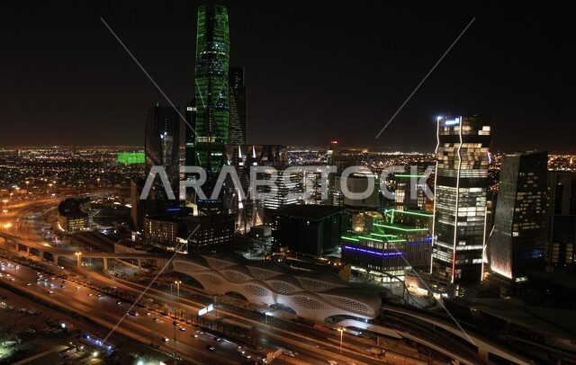 Creative image at night of towers and skyscrapers in Riyadh, Saudi Arabia, buildings and towers illuminated in green, celebration of the Saudi National Day, towers and skyscrapers, architecture in Saudi Arabia, famous landmarks of Riyadh, Saudi National D