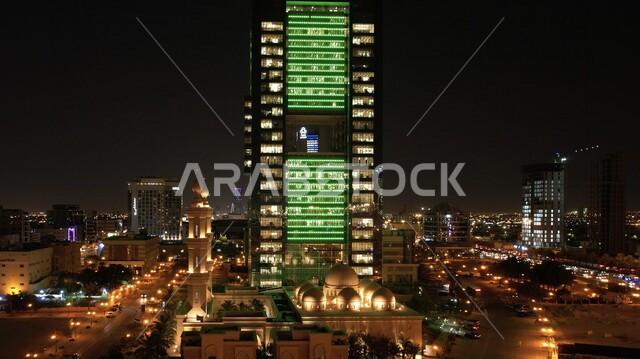 Creative image at night of towers and skyscrapers in Riyadh, Saudi Arabia, buildings and towers illuminated in green, celebration of the Saudi National Day, towers and skyscrapers, architecture in Saudi Arabia, famous landmarks of Riyadh, Saudi National D