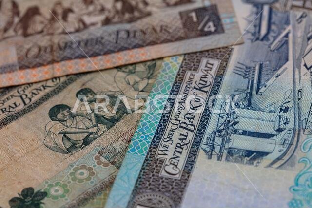 Dinar currency in the Kuwaiti markets, banknotes of different ...