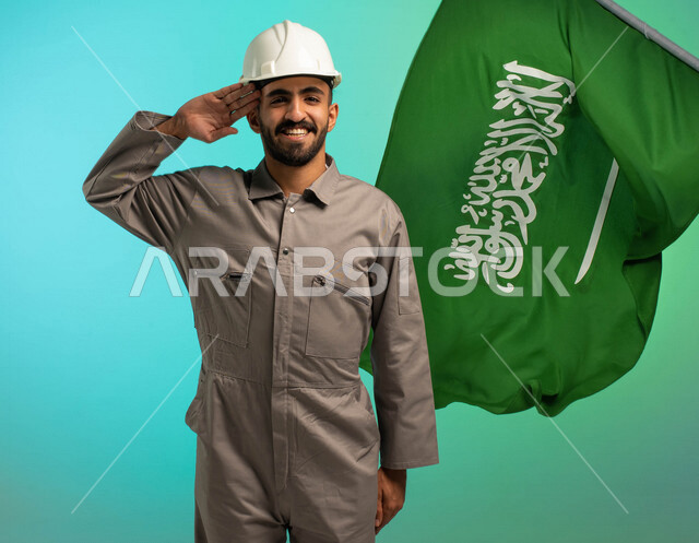 A Saudi Arabian Gulf technical engineer working in the construction sector, wearing a protective helmet, saluting his beloved country, the background of the Saudi flag, Saudi professions and jobs, Saudi labor, job opportunities, the profession of an elect
