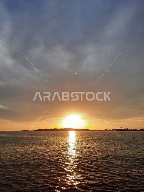 Aesthetic image of the Red Sea beach in Jeddah, Saudi Arabia at sunset, nature background, recreational tourist places, calm and beauty of the sea, Jeddah Corniche at sunset, sunset on the beach of Jeddah