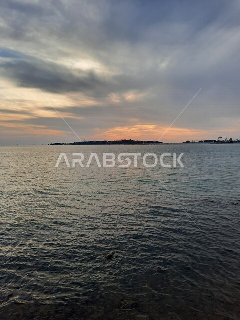 Aesthetic image of the Red Sea beach in Jeddah, Saudi Arabia at sunset, nature background, recreational tourist places, calm and beauty of the sea, Jeddah Corniche at sunset, sunset on the beach of Jeddah