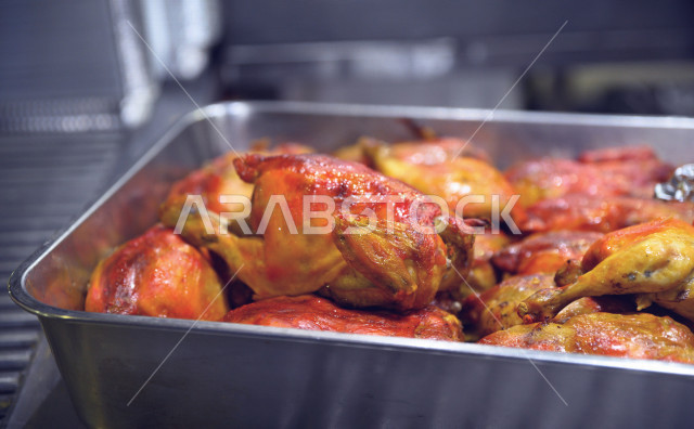 Grilled chicken on the grill, Saudi Arabian Gulf cuisine, fried chicken, spicy chicken skewers, fresh and delicious chicken broiler, Arabic food, healthy meal, Saudi Arabian Gulf restaurants