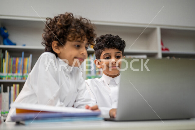 Saudi Arabian Gulf students in the classroom, e-learning, cooperation and participation among students, scientific research, the concept of group study, self-learning, an advanced educational school environment, innovative schools, quality education, acad