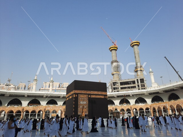 A picture of the Kaaba in Mecca, Saudi Arabia, performing Hajj and Umrah, circumambulating the Kaaba, worshiping and getting closer to God, Islamic religious landmarks in Saudi Arabia