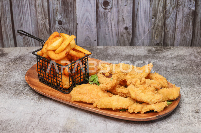 Close-up of crispy chicken, crispy fried chicken pieces, delicious broasted chicken, fast food, delicious recipes and dishes, delicious meals