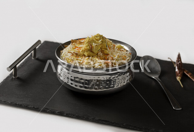 A plate of delicious biryani rice with meat, dazzling rice, traditional Arab dishes, Arab food, traditional dishes, delicious recipes and food dishes, delicious healthy meals, oriental restaurants, restaurants for oriental Arab food