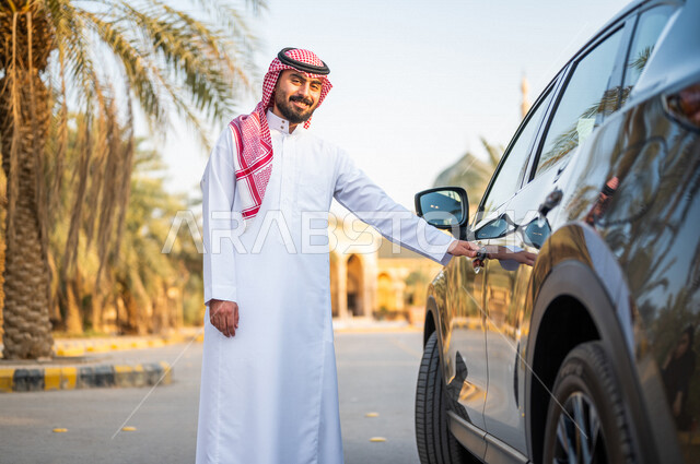 A Saudi Arabian Gulf man standing next to his car, getting ready to ride, passenger delivery service, safe transportation services, smiling face gestures, full length body image, standing with confidence