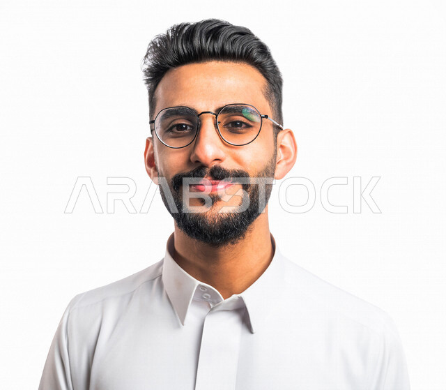 Portrait of a close-up of a smiling Saudi Arabian Gulf man, looking at the camera, wearing medical glasses for low vision, seeing through medical glasses, the concept of low vision, myopia, white background