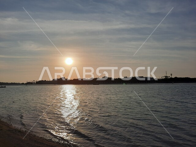 Aesthetic image of the Red Sea beach in Jeddah, Saudi Arabia at sunset, nature background, recreational tourist places, calm and beauty of the sea, Jeddah Corniche at sunset, sunset on the beach of Jeddah