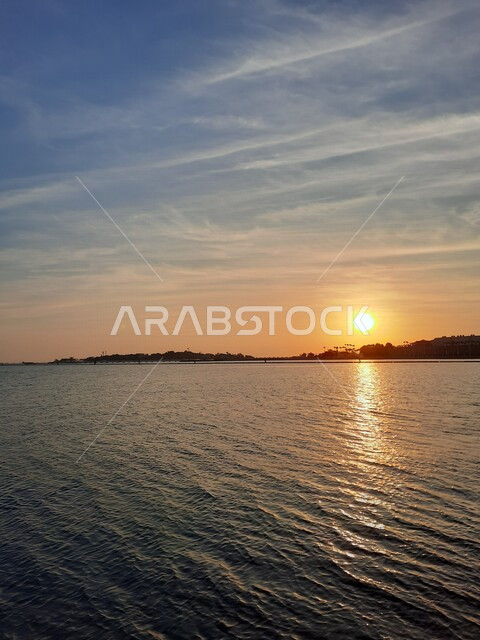 Aesthetic image of the Red Sea beach in Jeddah, Saudi Arabia at sunset, nature background, recreational tourist places, calm and beauty of the sea, Jeddah Corniche at sunset, sunset on the beach of Jeddah