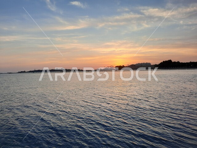 Aesthetic image of the Red Sea beach in Jeddah, Saudi Arabia at sunset, nature background, recreational tourist places, calm and beauty of the sea, Jeddah Corniche at sunset, sunset on the beach of Jeddah
