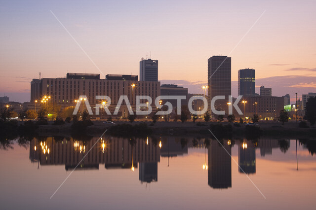 Creative image of the city of Jeddah in the Kingdom of Saudi Arabia at sunset, the architectural art in Saudi Arabia, a picture of the reflection of buildings on the Jeddah Corniche tourism, the famous tourist attractions of Jeddah
