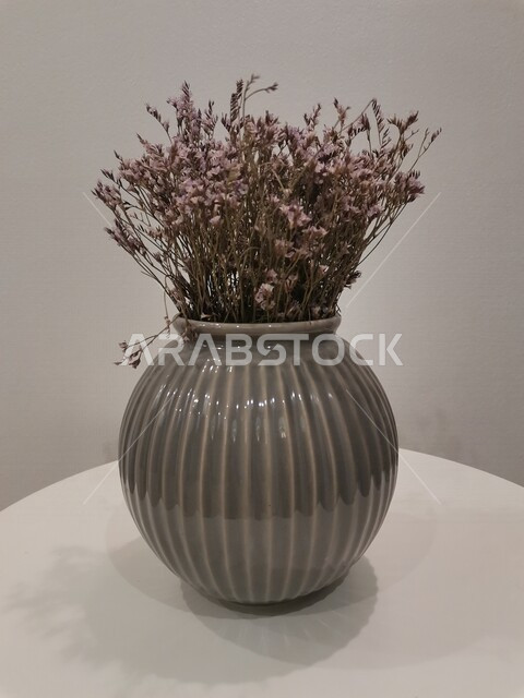 Close-up of a flower vase, gray background, flowers and ornamental flowers, decorations