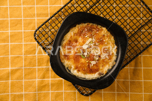 The delicious Um Ali dish, oriental sweets, sweets and sugars, delicious desserts, tahlia, delicious and delicious sweets, Umm Ali desserts, delicious dessert recipes and dishes, restaurants for Arab oriental food