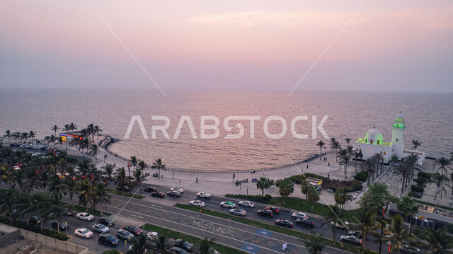 A wonderful view from the top of the Jeddah Corniche, the waterfront in the city of Jeddah in the Kingdom of Saudi Arabia, car traffic on the Corniche Road, enjoying the natural scenery, the tourist attractions in the coastal city of Jeddah