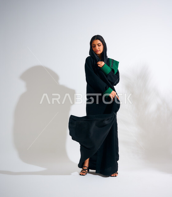 Saudi Look Model Portrait of a Saudi Arabian Gulf woman wearing an elegant black abaya ...
