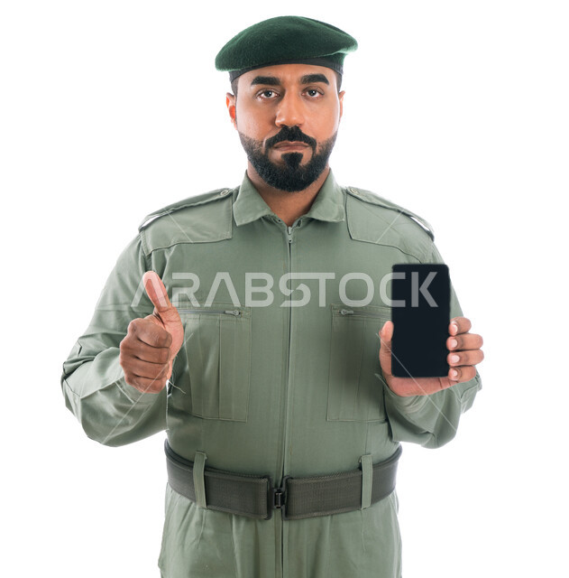 Portrait of an Arab Emirati Gulf security man wearing a green security suit, thumbs up gestures, proper use of mobile applications, following cybercrime laws, combating fraud and financial data theft, maintaining the security of personal information, whit