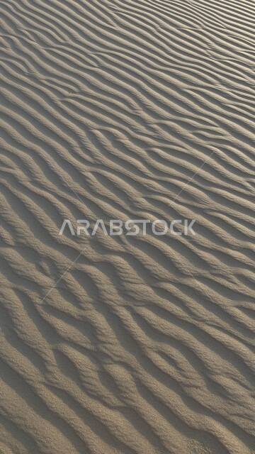 Sand dunes in desert areas, sand formations, golden sands in the desert, desert terrain, desert areas, beauty of desert nature