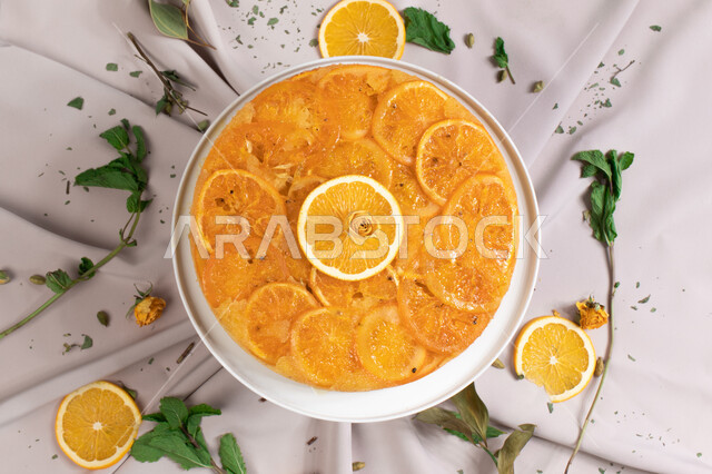 كيكة البرتقال مزينة بشرائح البرتقال ، حلويات وسكريات ، التحلاية ، قالب كيك ، مخبوزات طازجة ، شرائح البرتقال