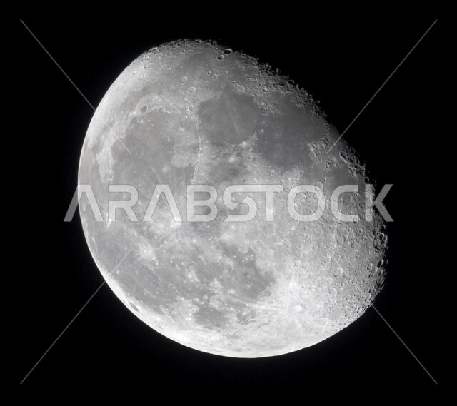 A close-up of the moon in outer space, the moon in a 3D humpback shape shining in the sky, the light of the moon at night, the background of the moon