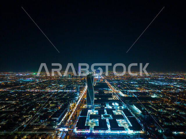 The city of Riyadh at night, towers and skyscrapers, the capital of Riyadh, the famous tourist attractions of Riyadh in the Kingdom of Saudi Arabia, the skyline of the city of Riyadh, an aerial photo from above on King Fahd Road in Riyadh, the Majdol Towe