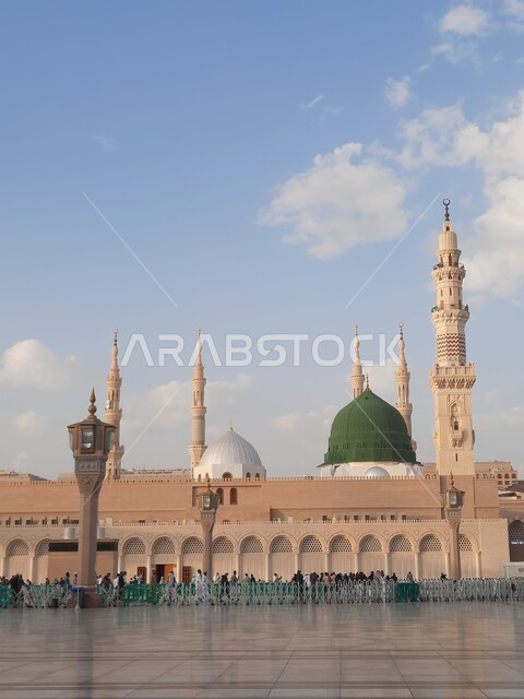 The square of the Prophet’s Mosque in Medina, Saudi Arabia, the Prophet’s Noble Sanctuary, Islamic holy places, Muslims gathered in the outer complex of the Prophet’s Mosque in Medina, electronic umbrellas, Islamic religious landmarks