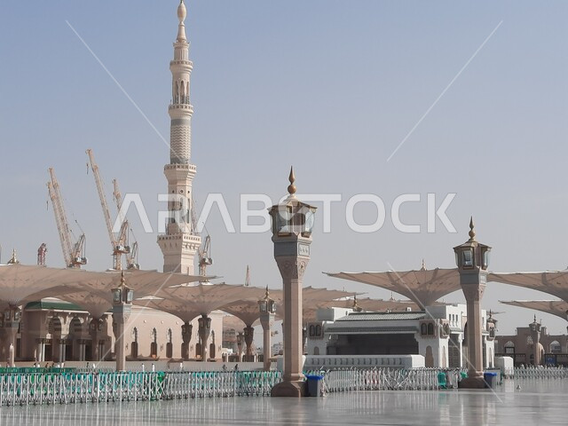 The Prophet’s Mosque in Madinah, Saudi Arabia, the courtyard of the Prophet’s Mosque, the Prophet’s Noble Sanctuary, Islamic holy places, electronic umbrellas, Islamic religious landmarks
